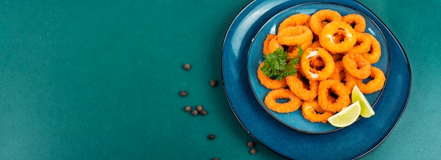 Deep fried calamari or squid rings delicious fried food space for text