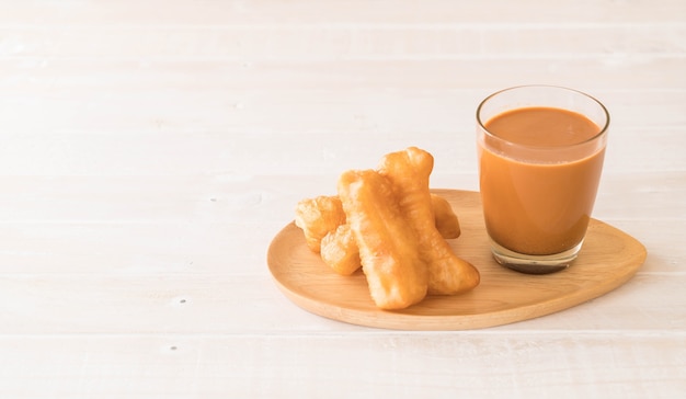 deep-fried dough stick with milk tea