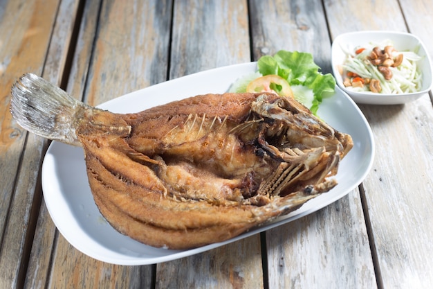 Deep fried sea bass fish with Thai spicy sauce.