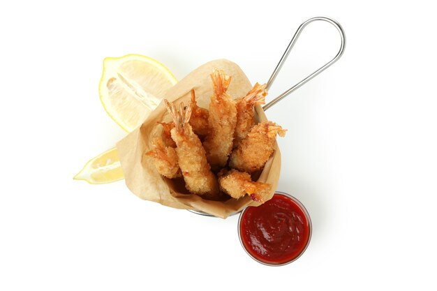 Deep-fried shrimp in deep fryer isolated on white background