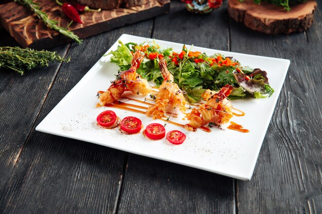 Deep fried shrimps arugula and flying fish roe