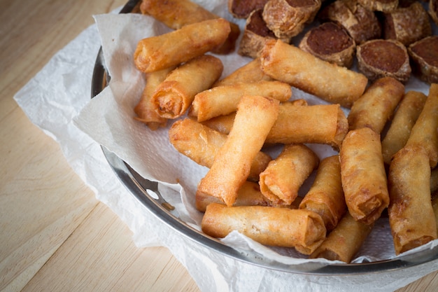 Deep fried spring rolls and deep fried chicken rolls