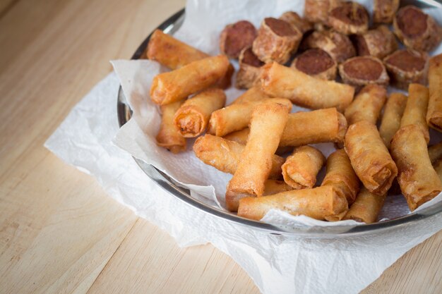 Deep fried spring rolls and deep fried chicken rolls