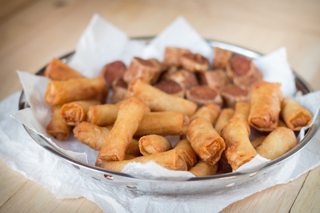 Deep fried spring rolls and deep fried chicken rolls