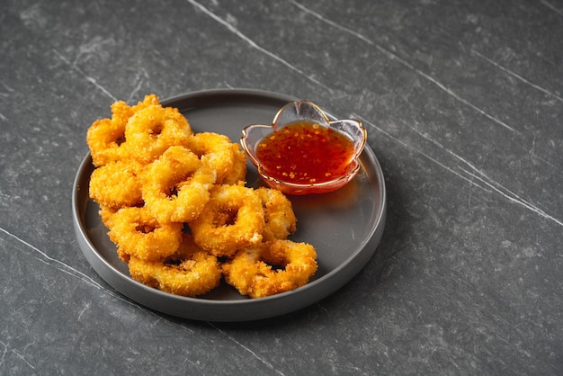 Deep fried squid rings breaded with thai sauce.