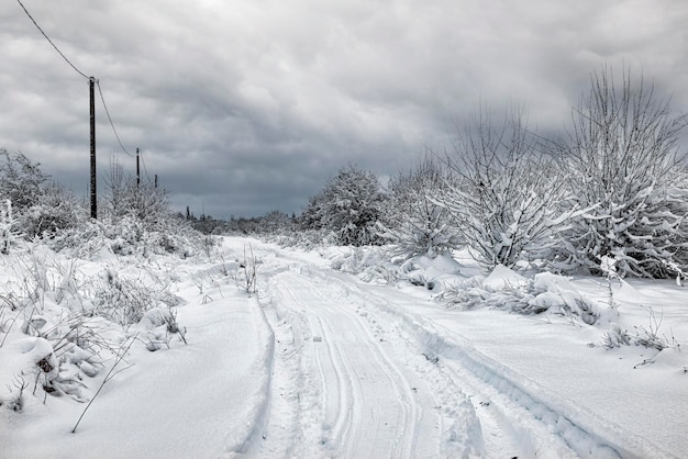 Deep rut on the road with fresh fallen snow