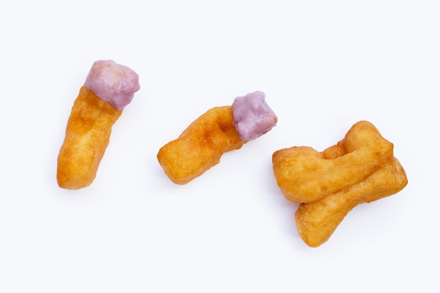 Deepfried dough stick or chinese bread stick with taro custard on white background