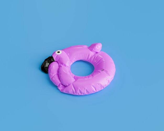 Photo deflated pink flamingo float on blue background