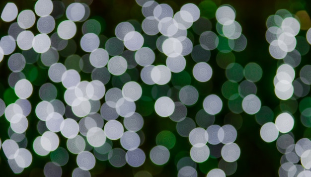 Defocus of green and white light background