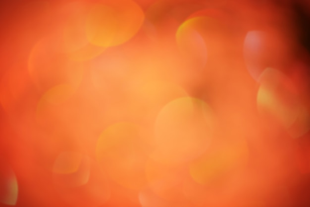 Defocus licht oranje schittering. Glitter als een abstracte achtergrond.