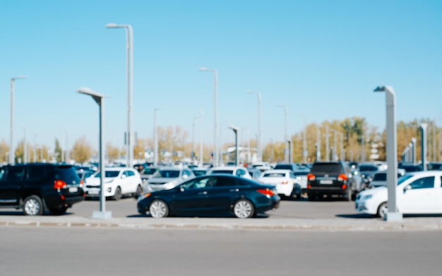 Photo defocus parking outdoors many parked cars side view