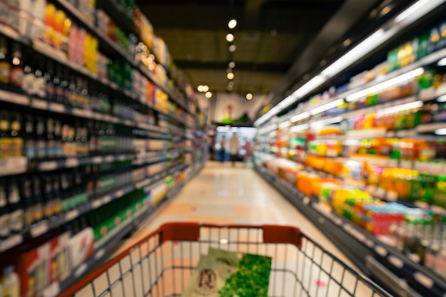 Defocused blur put on the at alcohol drink products in supermarket