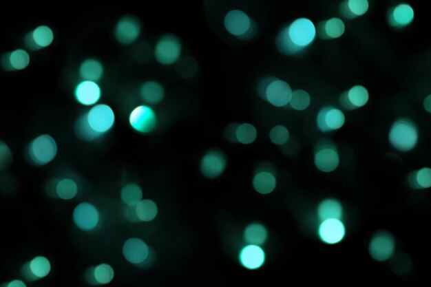 Photo defocused bokeh lights on black background abstract blurred backdrop for christmas eve or birthday