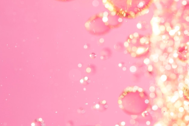 Photo defocused bubbles on pink background