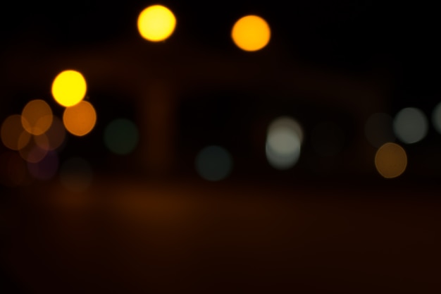 Defocused city night filtered bokeh abstract background