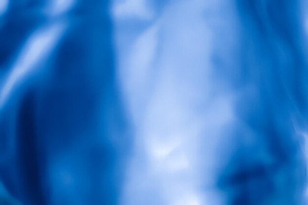 Defocused image of blue satin