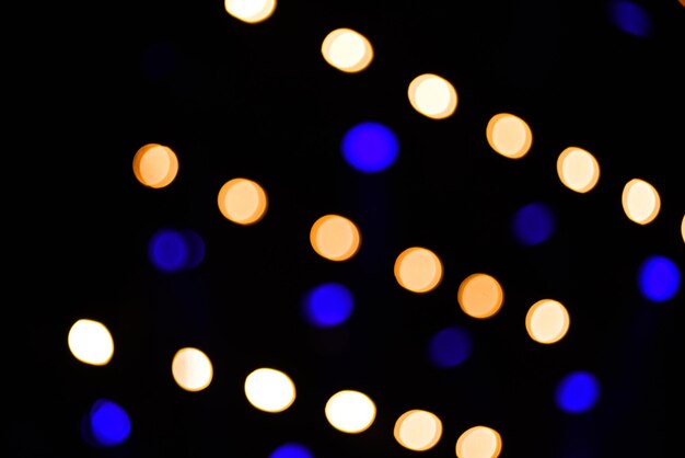 Defocused image of christmas lights at night