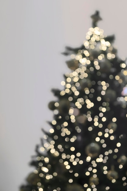 Defocused image of christmas tree against sky