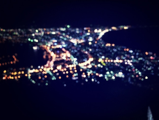 Photo defocused image of cityscape at night