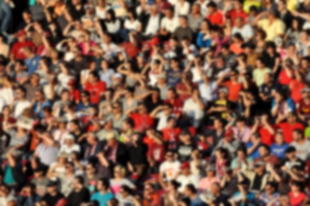 Photo defocused image of crowd at soccer stadium