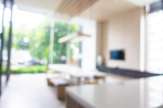 Defocused image of empty chairs and table