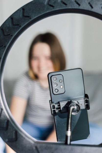 Photo defocused image of girls vlogging