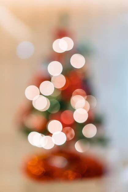 Photo defocused image of illuminated christmas tree