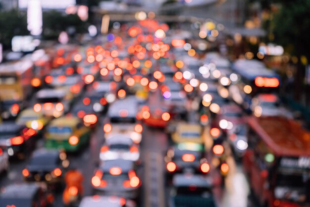 Defocused image of illuminated city street at night