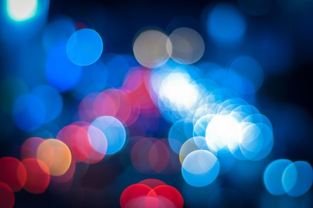 Defocused image of illuminated lights at night