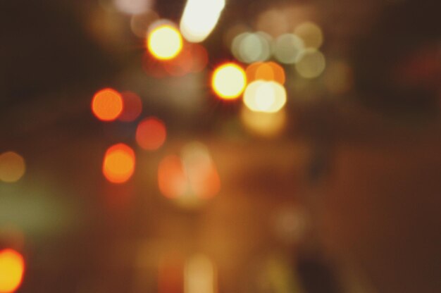 Defocused image of illuminated lights at night