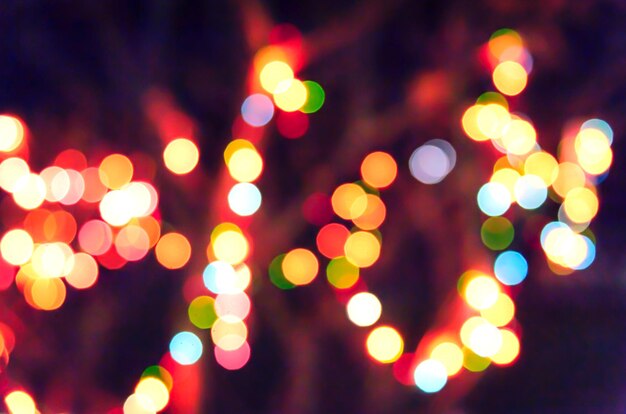 Defocused image of illuminated lights at night