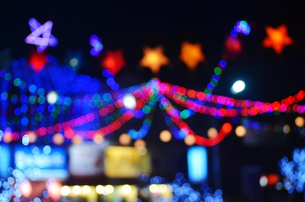 Defocused image of illuminated lights at night