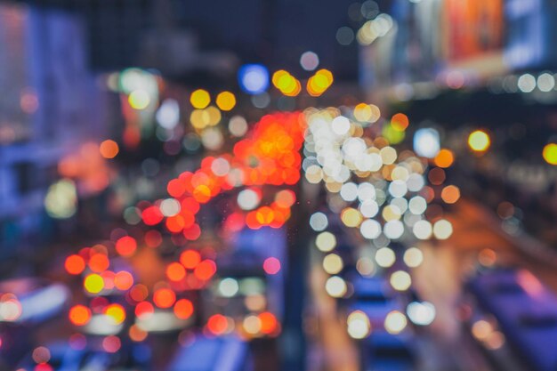 Defocused image of illuminated lights at night