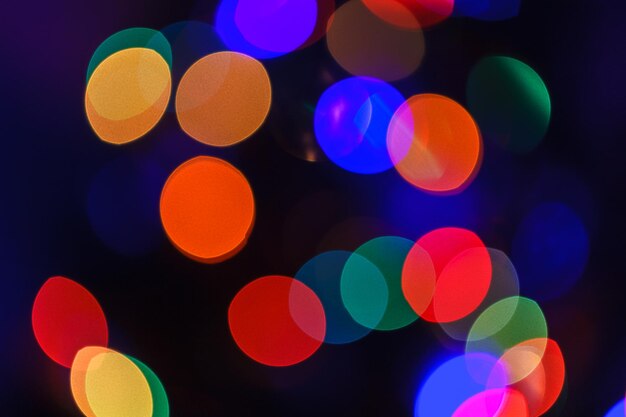 Defocused image of illuminated lights at night