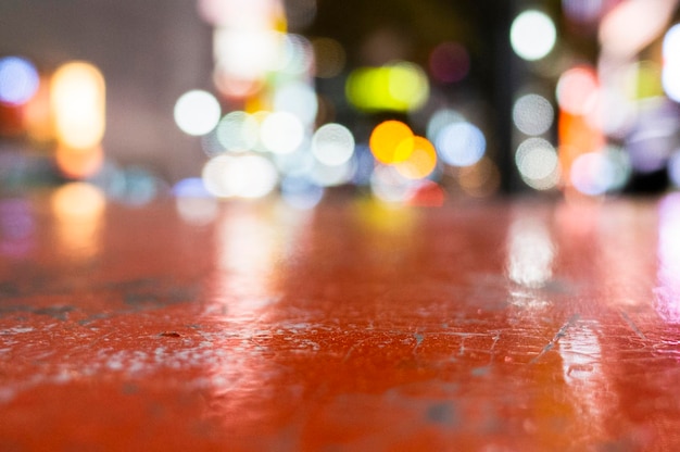 Defocused image of illuminated lights on street