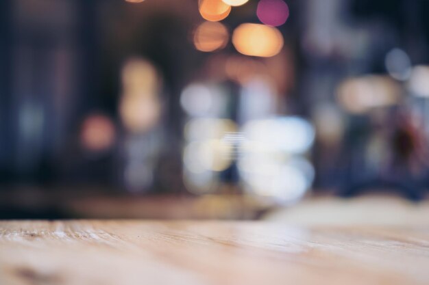 Photo defocused image of illuminated lights on table