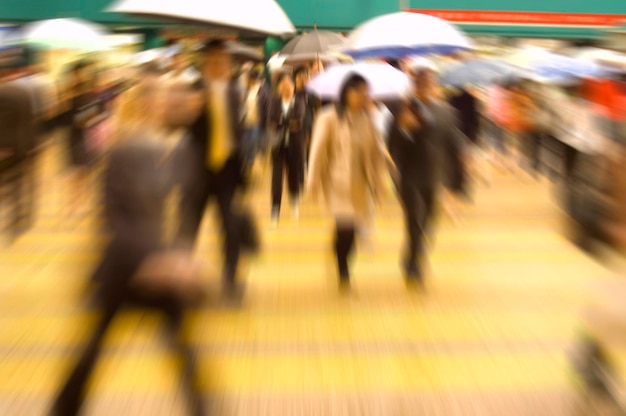 Photo defocused image of people walking in city