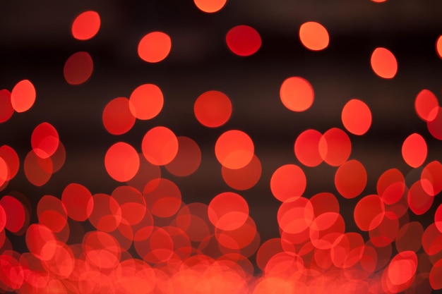 Photo defocused image of red illuminated lights at night