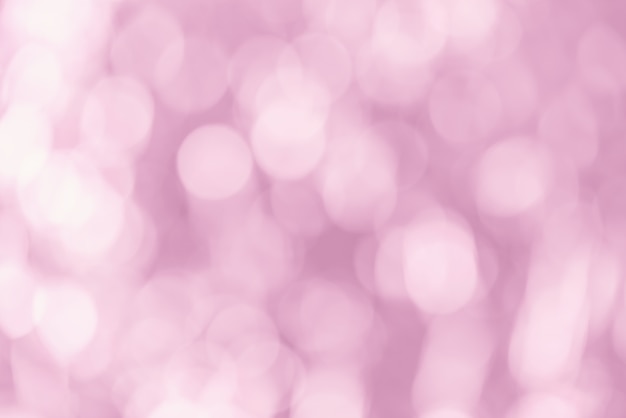 Defocused lights abstract pink round bokeh background 