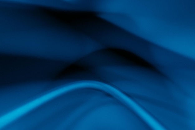 Defocused neon glow futuristic background blue