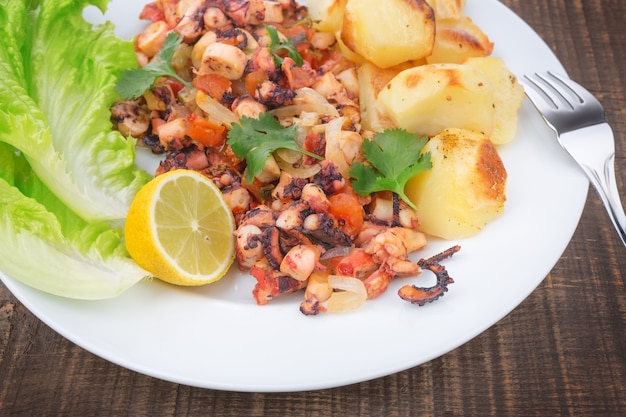 Delicacy dish of grilled octopus, marine products.