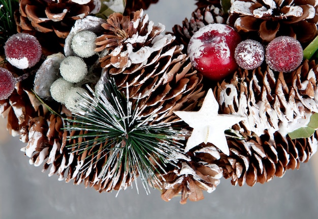 Delicate Christmas wreath of pine cones 