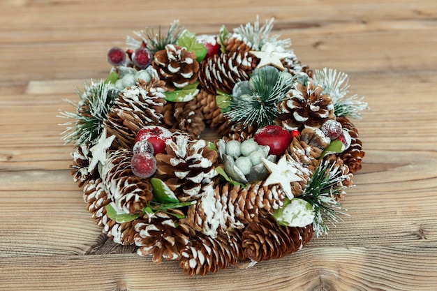 Delicate Christmas wreath of pine cones 