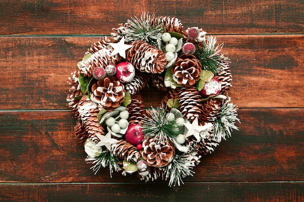 Delicate Christmas wreath of pine cones  