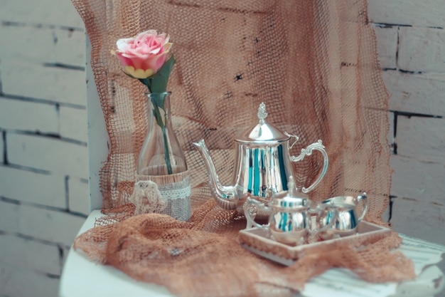 Delicate composition with flowers in a vase