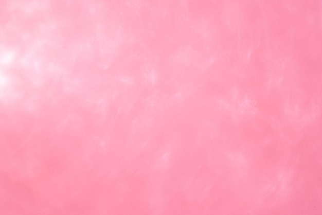 Delicate pink background with sequins waves liquid motion