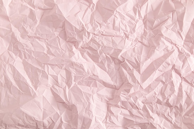 Delicate roze achtergrond van verfrommeld papier papier abstracte achtergrond sjabloon lay-out productpresentatie