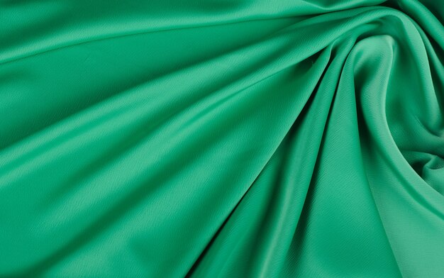 Delicate texture of wavy green chiffon fabric