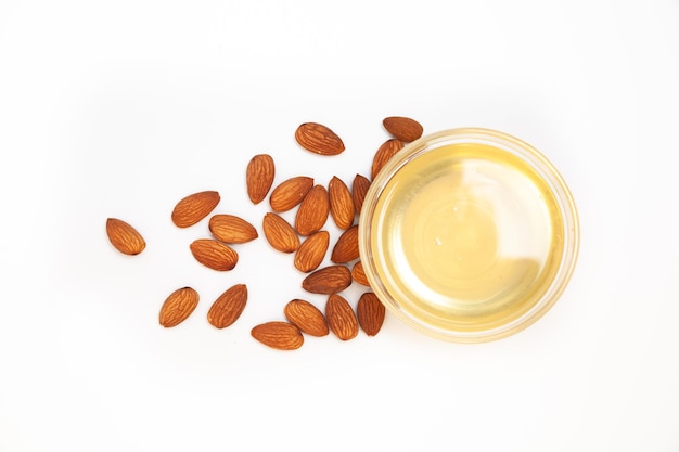 Delicious almond oil with raw peeled almonds