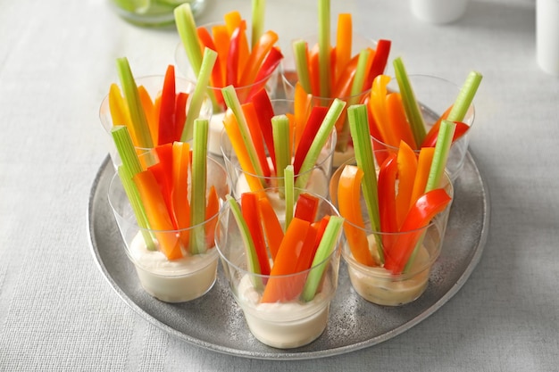 Delicious appetizers for baby shower on metal plate